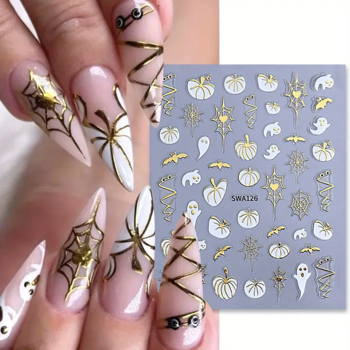 Halloween nail art sticker sheet SWA126, white and gold pumpkins, webs and ghosts, beside stiletto nails wearing them
