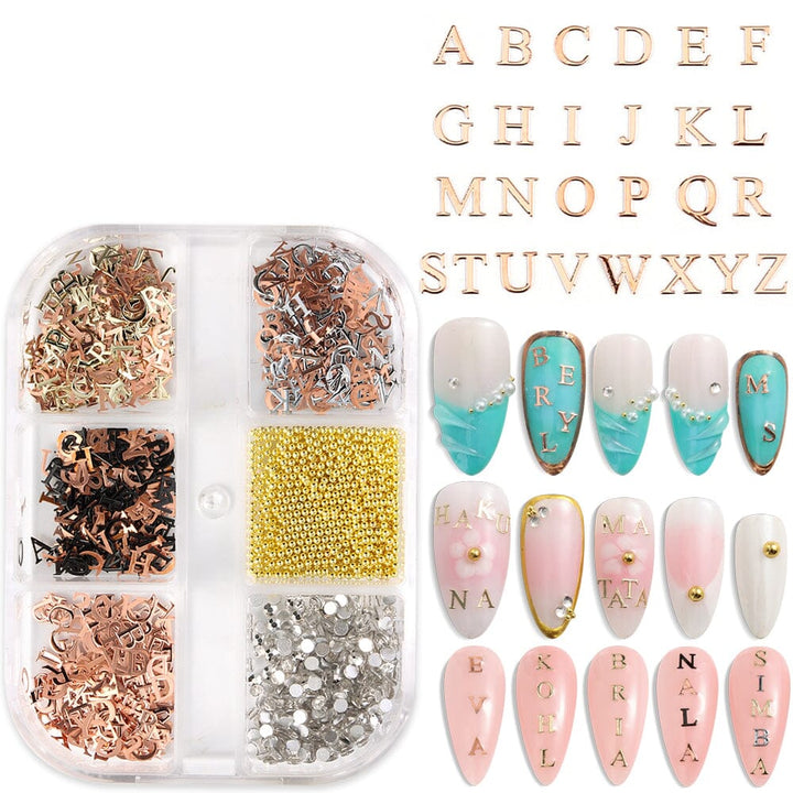 Metallic 3D alphabet nail art letters A–Z set, gold/silver/black charms with beads and rhinestones in storage box for manicures