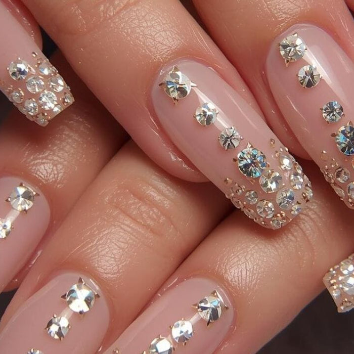How to attach rhinestones to nails