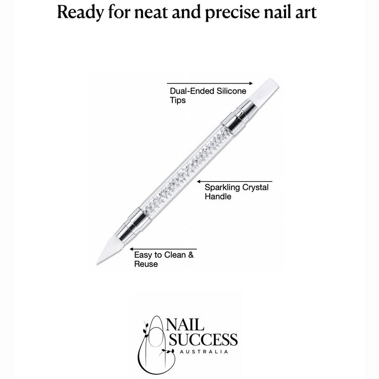 Reusable double-ended white silicone nail art pen with pointed and angled tips and a sparkling crystal handle