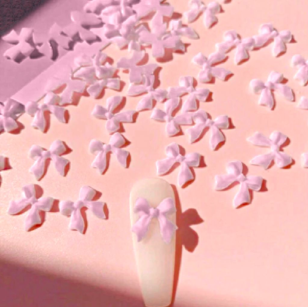 Pink 3D bow nail charms (30 pcs) – flatback ribbon bows for kawaii nail art; easy stick-ons for acrylic, gel, and press-on nails