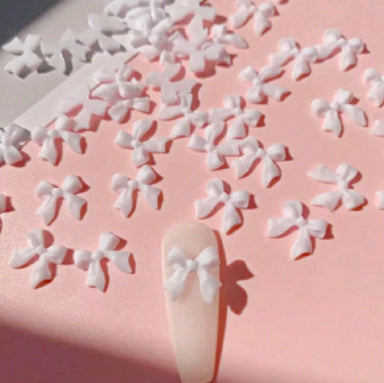 White 3D bow nail charms (30 pcs) – flatback resin ribbon bows for cute manicure designs; stick-on nail art for acrylic, gel & press-on nails