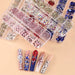 3D nail art rhinestone set with mixed shapes and colours in organiser cases with decorated nail samples