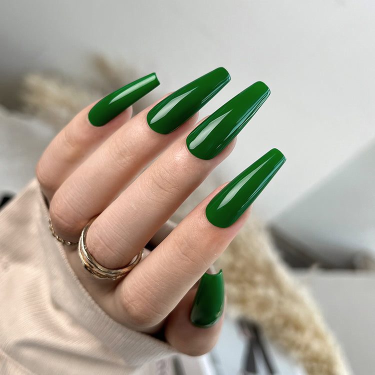 Nail Success Australia gel polish C047 in rich kelly green, shown on a model's long glossy coffin nails