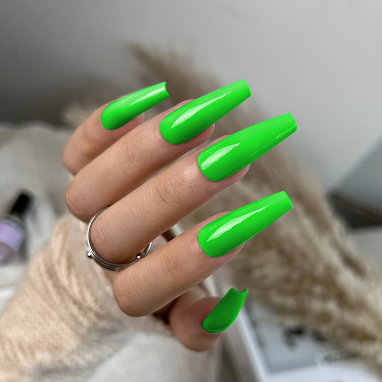 Nail Success Australia gel polish C048 in bright neon green, shown on a model's long glossy coffin nails