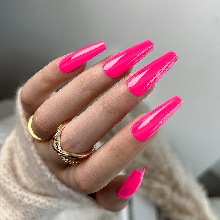 Nail Success Australia gel polish C054 in bright hot pink, shown on a model's long glossy coffin nails