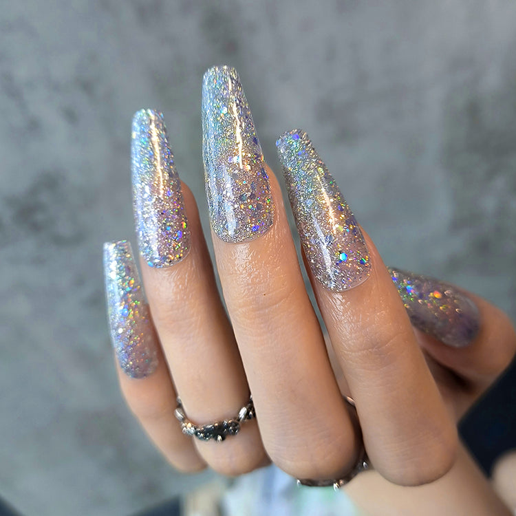 Nail Success Australia gel polish C056 in silver holographic glitter, shown on a model's long glossy coffin nails