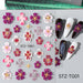 STZ-TG01 5D Embossed Orchid Flower Nail Art Sticker sheet with pink, purple, red and white floral designs on manicure samples