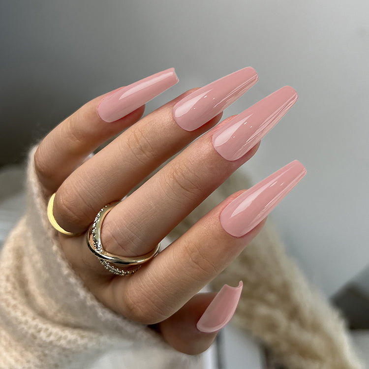 Nail Success Australia gel polish C077 in a soft dusty rose nude, shown on a model's long glossy coffin nails