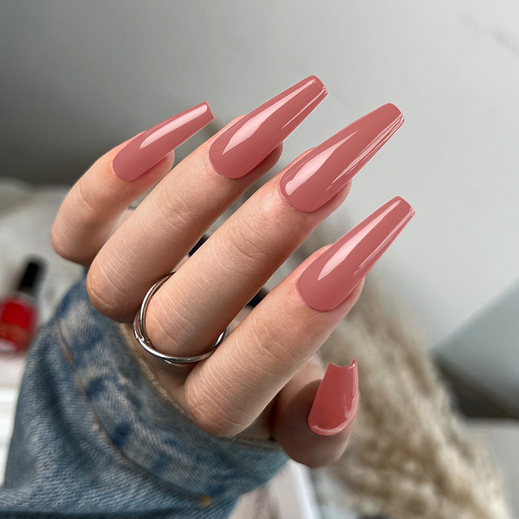 Nail Success Australia gel polish C078 in a dusty rose mauve pink, shown on a model's long glossy coffin nails