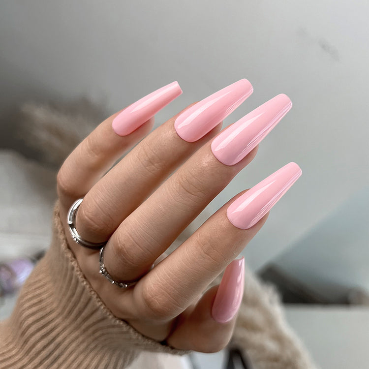 Nail Success Australia gel polish C079 in a soft baby pink, shown on a model's long glossy coffin nails