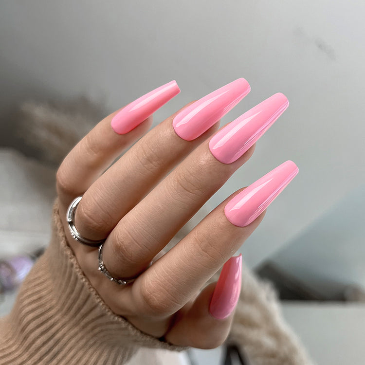 Nail Success Australia gel polish C080 in a soft bubblegum pink, shown on a model's long glossy coffin nails