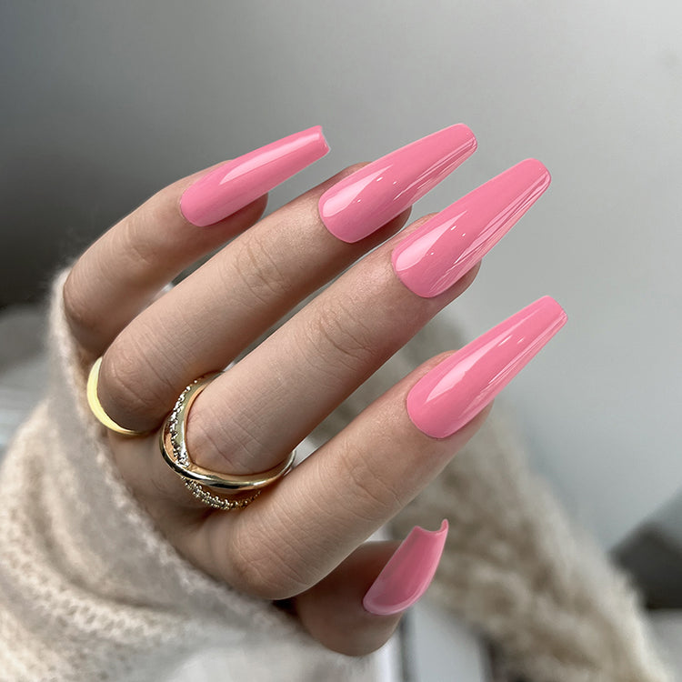 Nail Success Australia gel polish C081 in a warm rose pink, shown on a model's long glossy coffin nails