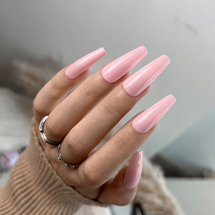 Nail Success Australia gel polish C083 in a soft pale pink, shown on a model's long glossy coffin nails