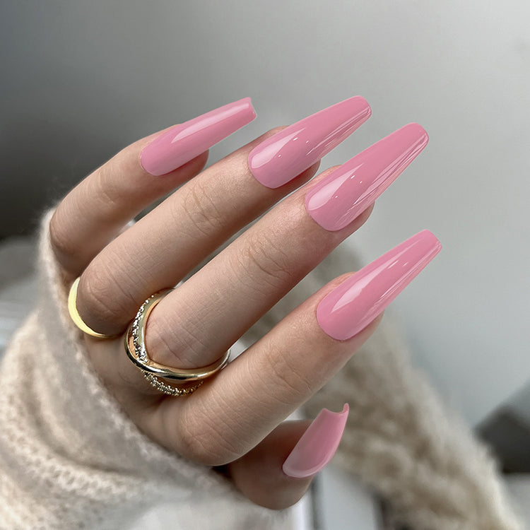 Nail Success Australia gel polish C084 in a dusty rose pink, shown on a model's long glossy coffin nails