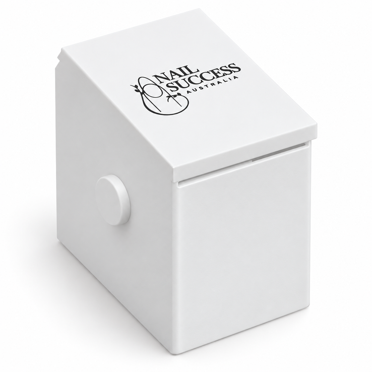 White nail form dispenser with a black Nail Success Australia logo on the sloping lid, a front dispensing slot and round side knob.
