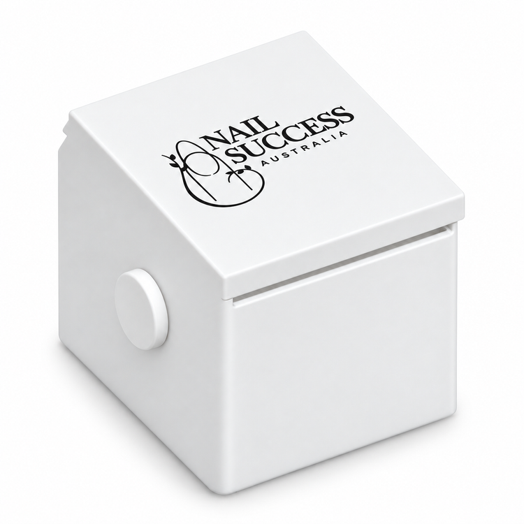 Compact white nail form dispenser with a black Nail Success Australia logo on the sloping lid, a front dispensing slot and round side knob.
