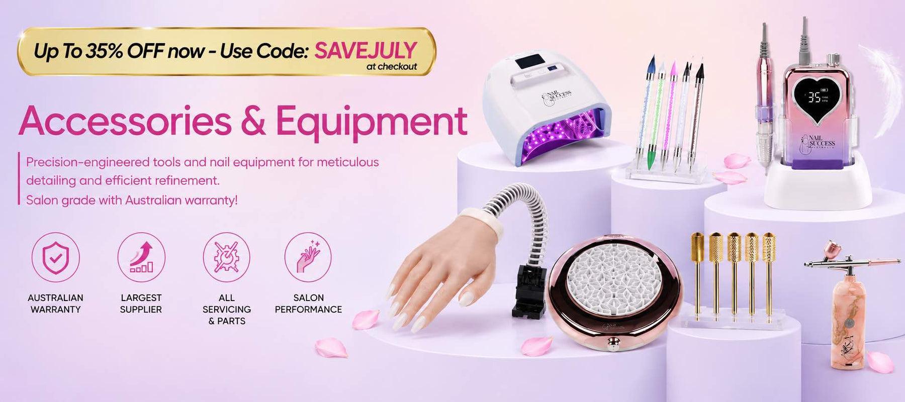 A promotional banner for nail care accessories and equipment, featuring a UV nail lamp, nail drill press, nail files, nail brushes, a nail polish bottle, and a manicure tray arranged on white pedestals against a soft pink background. A human hand is shown holding the drill arm, which classifies the subject_type as Lifestyle.