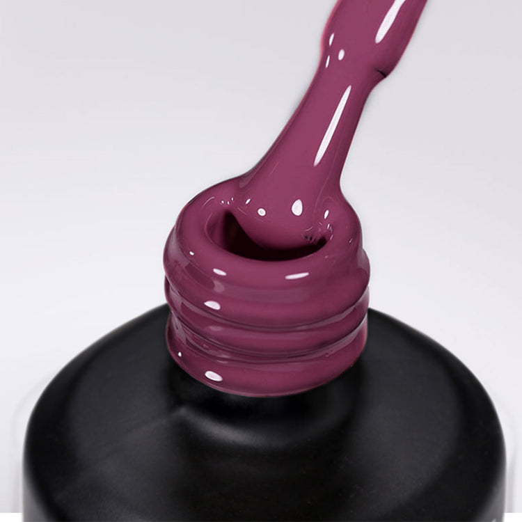 Nail Success Australia gel polish C089 in a plum berry purple, a close-up of the brush lifting from the bottle neck showing the creamy colour
