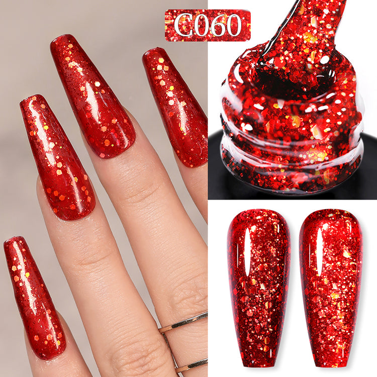 Nail Success Australia gel polish C060 in a rich red glitter with gold flakes, shown on a model's long coffin nails alongside the bottle and gloss and matte swatch tips