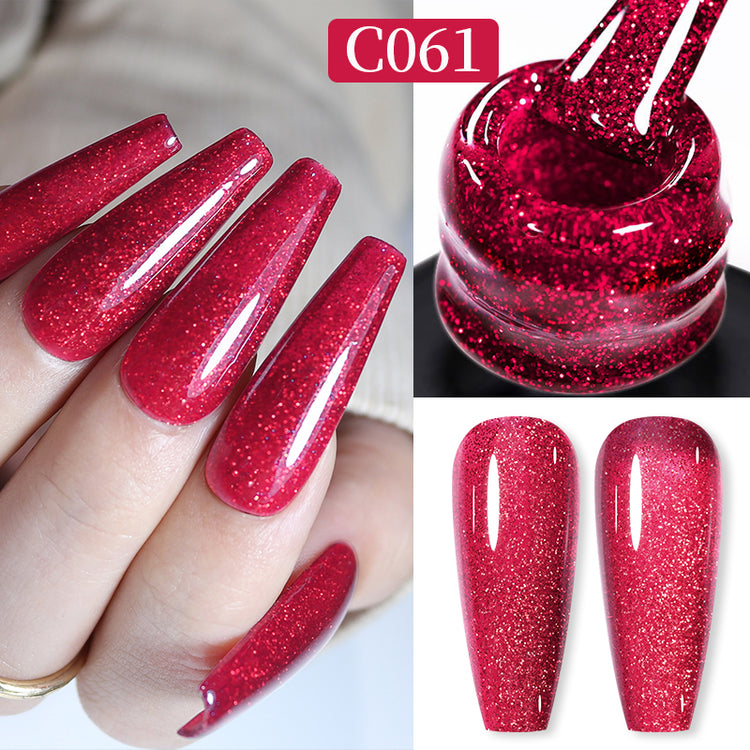 Nail Success Australia gel polish C061 in a sparkling raspberry red reflective glitter, shown on a model's long coffin nails alongside the bottle and gloss and matte swatch tips