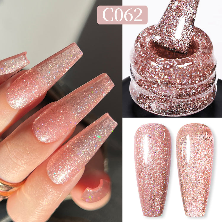 Nail Success Australia gel polish C062 in a rose gold champagne reflective glitter, shown on a model's long coffin nails alongside the bottle and gloss and matte swatch tips
