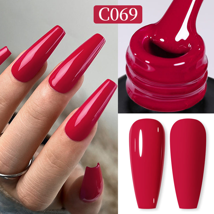 Nail Success Australia gel polish C069 in a vivid raspberry red, shown on a model's long glossy coffin nails alongside the bottle and gloss and matte swatch tips