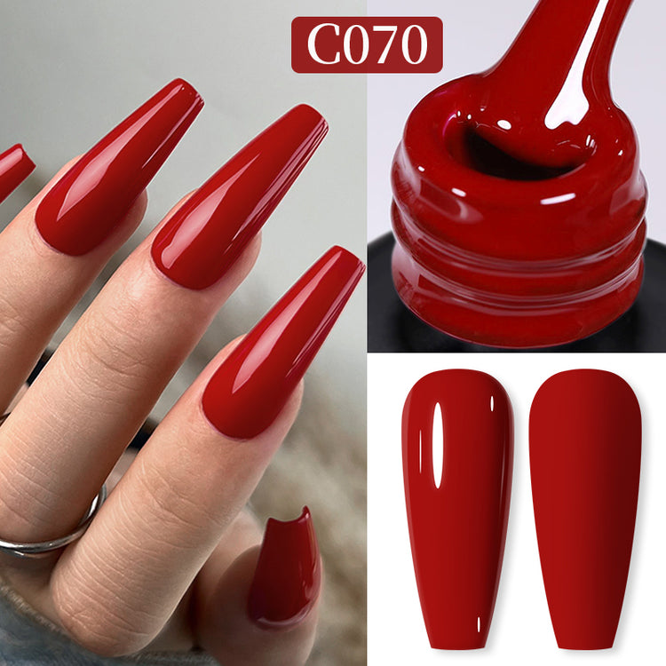 Nail Success Australia gel polish C070 in a classic true red, shown on a model's long glossy coffin nails alongside the bottle and gloss and matte swatch tips