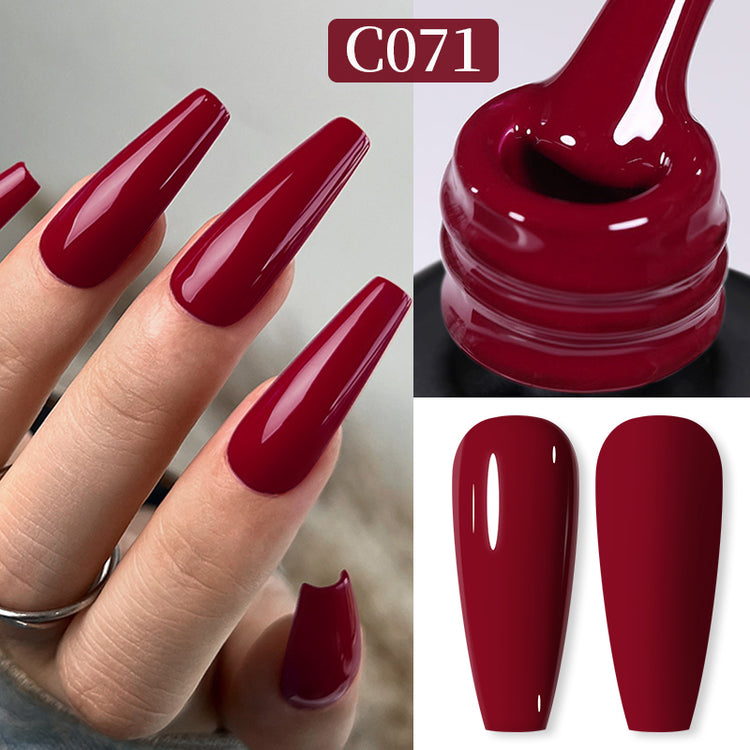 Nail Success Australia gel polish C071 in a deep wine red, shown on a model's long glossy coffin nails alongside the bottle and gloss and matte swatch tips