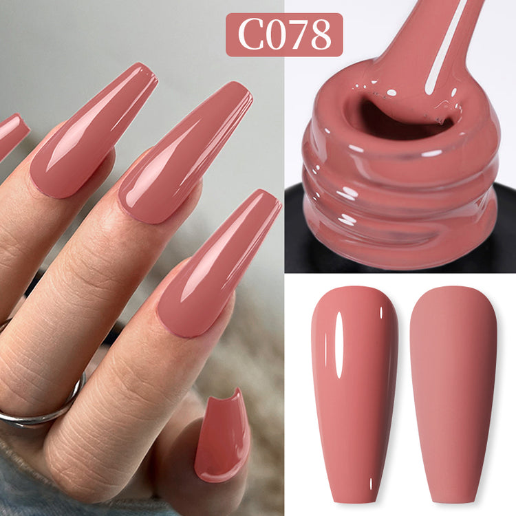 Nail Success Australia gel polish C078 in a dusty rose mauve pink, shown on a model's long glossy coffin nails alongside the bottle and gloss and matte swatch tips