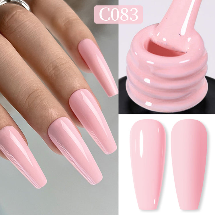 Nail Success Australia gel polish C083 in a soft pale pink, shown on a model's long glossy coffin nails alongside the bottle and gloss and matte swatch tips