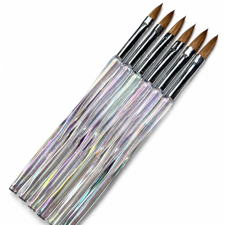 Acrylic nail brush set with clear aurora crystal handles, silver ferrules and pointed brown bristles for professional acrylic nail application