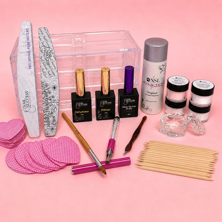 Acrylic nail student kit with acrylic powder, monomer, primer, dehydrator, top coat, nail files, dappen dish, practice tools and manicure essentials on a pink background