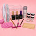 Acrylic nail student kit with acrylic powder, monomer, primer, dehydrator, top coat, nail files, dappen dish, practice tools and manicure essentials on a pink background