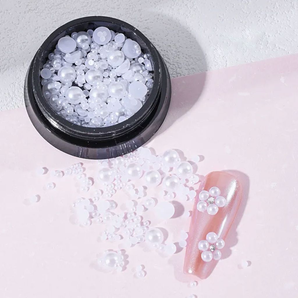 NSI Australia white half pearls for nail art — mixed-size flatback pearls in jar with sample pink nail tip