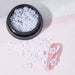 NSI Australia white half pearls for nail art — mixed-size flatback pearls in jar with sample pink nail tip