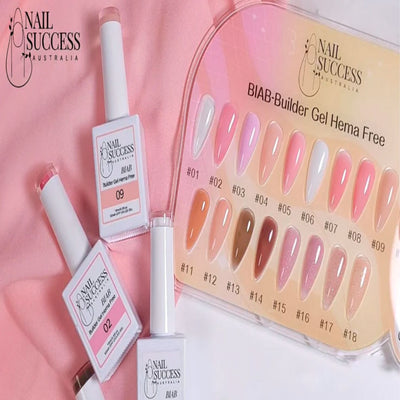 Nail Success BIAB Builder Gel HEMA-Free—18-colour swatch board with bottles (02 & 09) on pink fabric