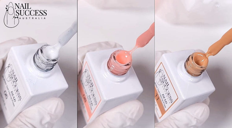 Nail Success HEMA-Free BIAB builder gel—shades 06 Milky White, 09 peach pink, and 17 nude—shown being lifted from bottles with brushes