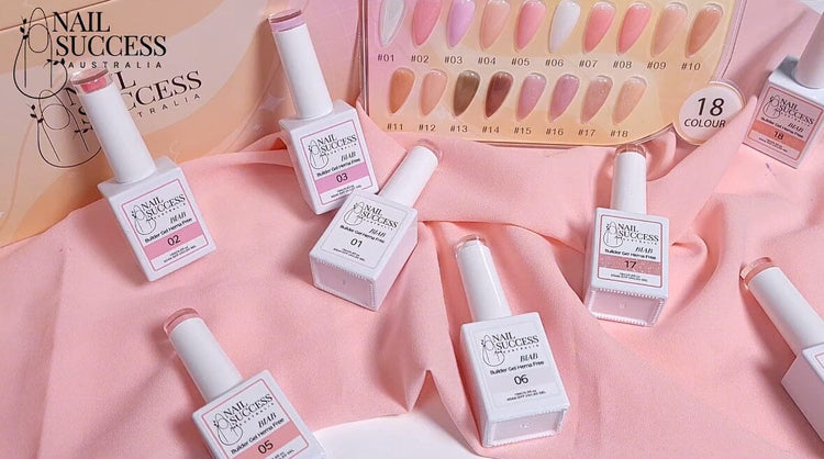 Nail Success BIAB Builder Gel HEMA-Free — bottles of shades 01, 02, 03, 05, 06 & 17 on pink fabric with 18-colour swatch board