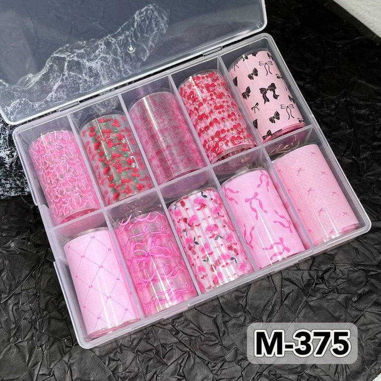Pink bow and cherry nail transfer foil set with 10 assorted rolls in storage box, featuring floral, ribbon and cherry designs for nail art manicures