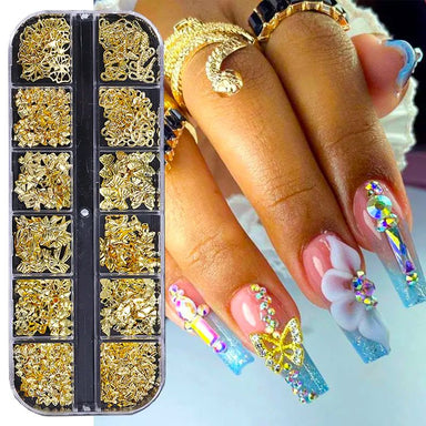Gold nail art charms mix in storage case with rhinestone butterfly and 3D flower acrylic nail design