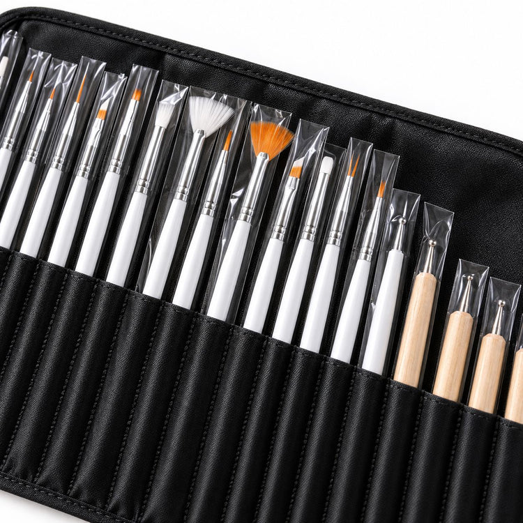 Close-up of nail art brushes and dotting tools in clear protective sleeves, organised in individual pockets of a black storage case.