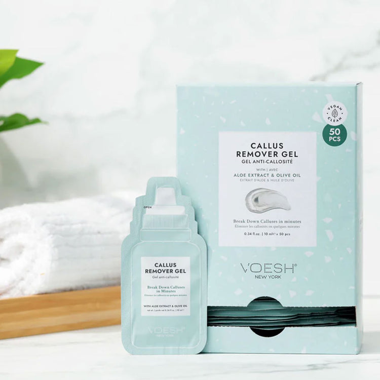 VOESH New York Callus Remover Gel sachet and 50-piece box with aloe extract and olive oil on spa countertop