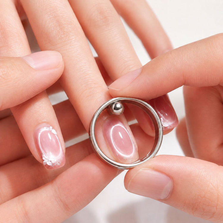 Circle Halo Cat Eye Magnet tool used over glossy pink nail to create a halo cat eye effect, NSI Australia