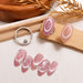 Circle Halo Cat Eye Magnet tool displayed with pink halo cat eye nail art swatches and floral manicure design, NSI Australia