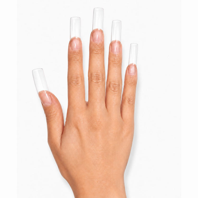 Classic clear nail tips applied to natural nails for professional nail extensions and salon tip application
