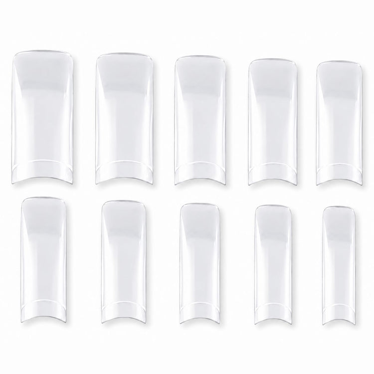 Classic clear nail tips in assorted sizes displayed on white background for professional nail extensions and salon manicures