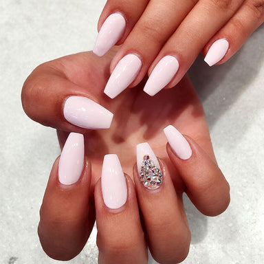 Long pale pink coffin nails with a crystal accent nail created on NSI Coffin Nail Tips
