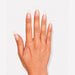 Hand wearing natural NSI Coffin Nail Tips applied over the natural nail