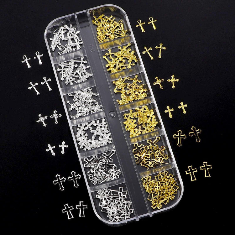 Gold and silver cross nail charms in organiser tray for 3D religious nail art decorations and salon manicure designs